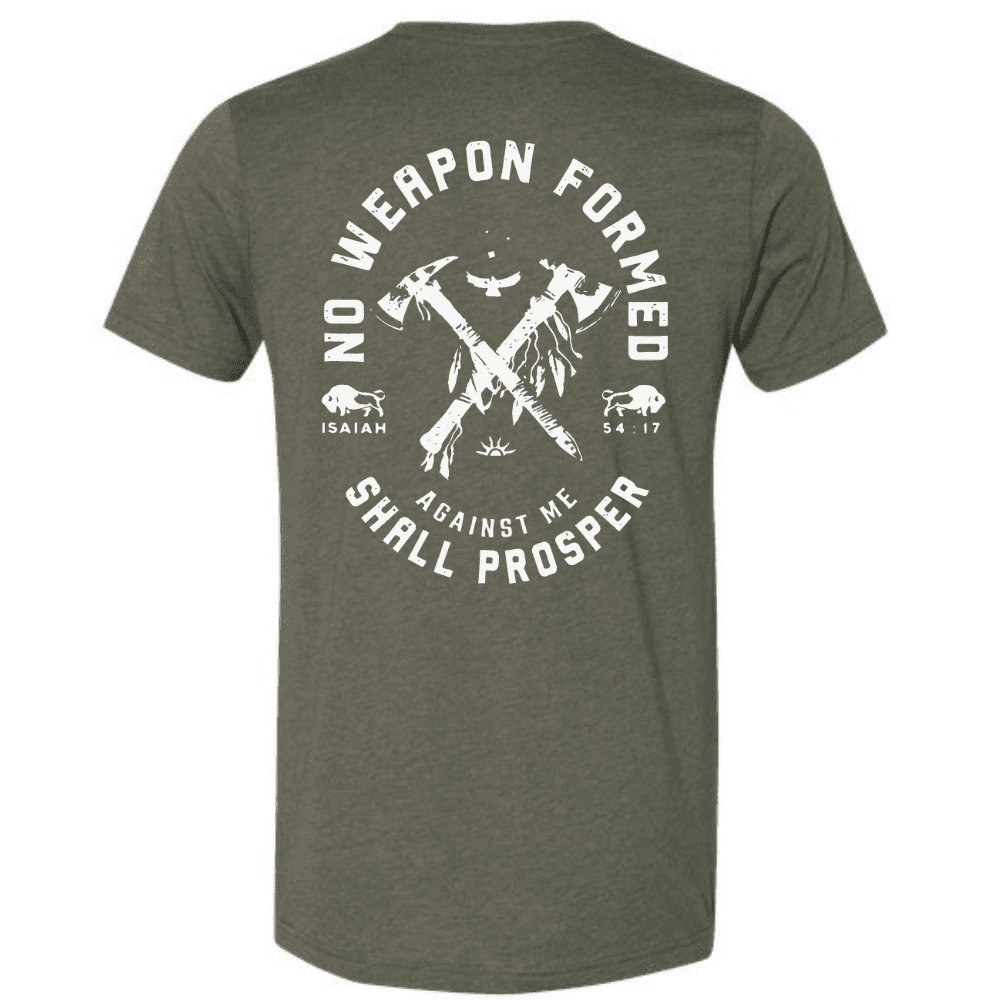 Back of olive green T-shirt with bold Isaiah 54:17 graphic reading “No weapon formed against me shall prosper” with tomahawks and buffalo