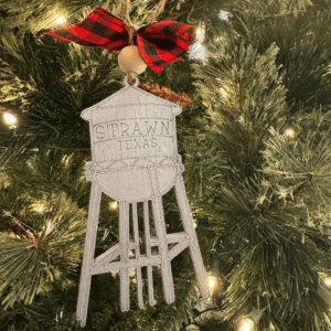 Wooden ornament engraved with the Strawn, TX watertower