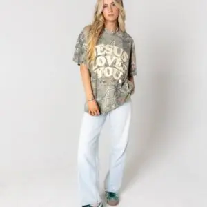 Jesus Loves You camo t-shirt worn by female model