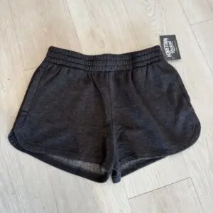 Black acid washed elastic waistband shorts with side pockets and relaxed fit