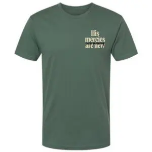 Front of sage green Christian t-shirt with His Mercies Are New chest graphic