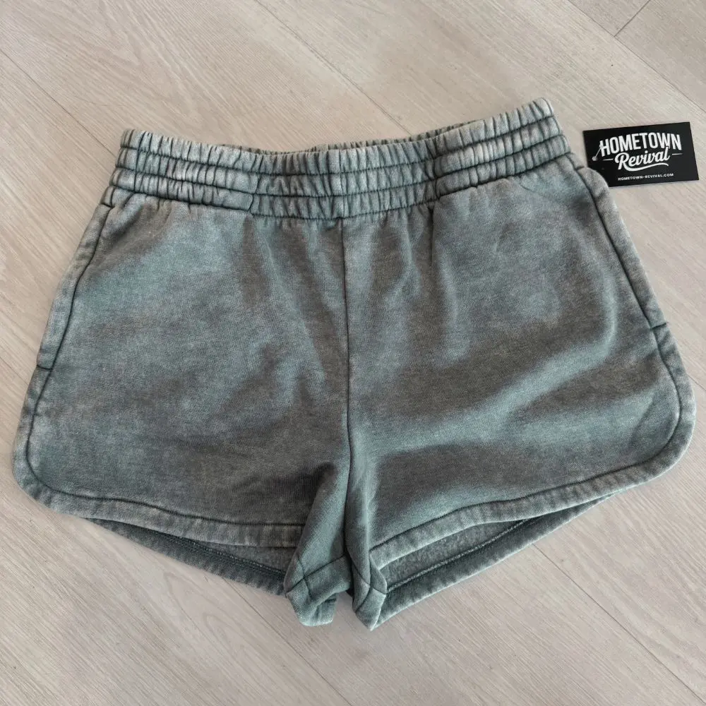 ade acid washed elastic waistband shorts with side pockets and vintage mineral wash finish