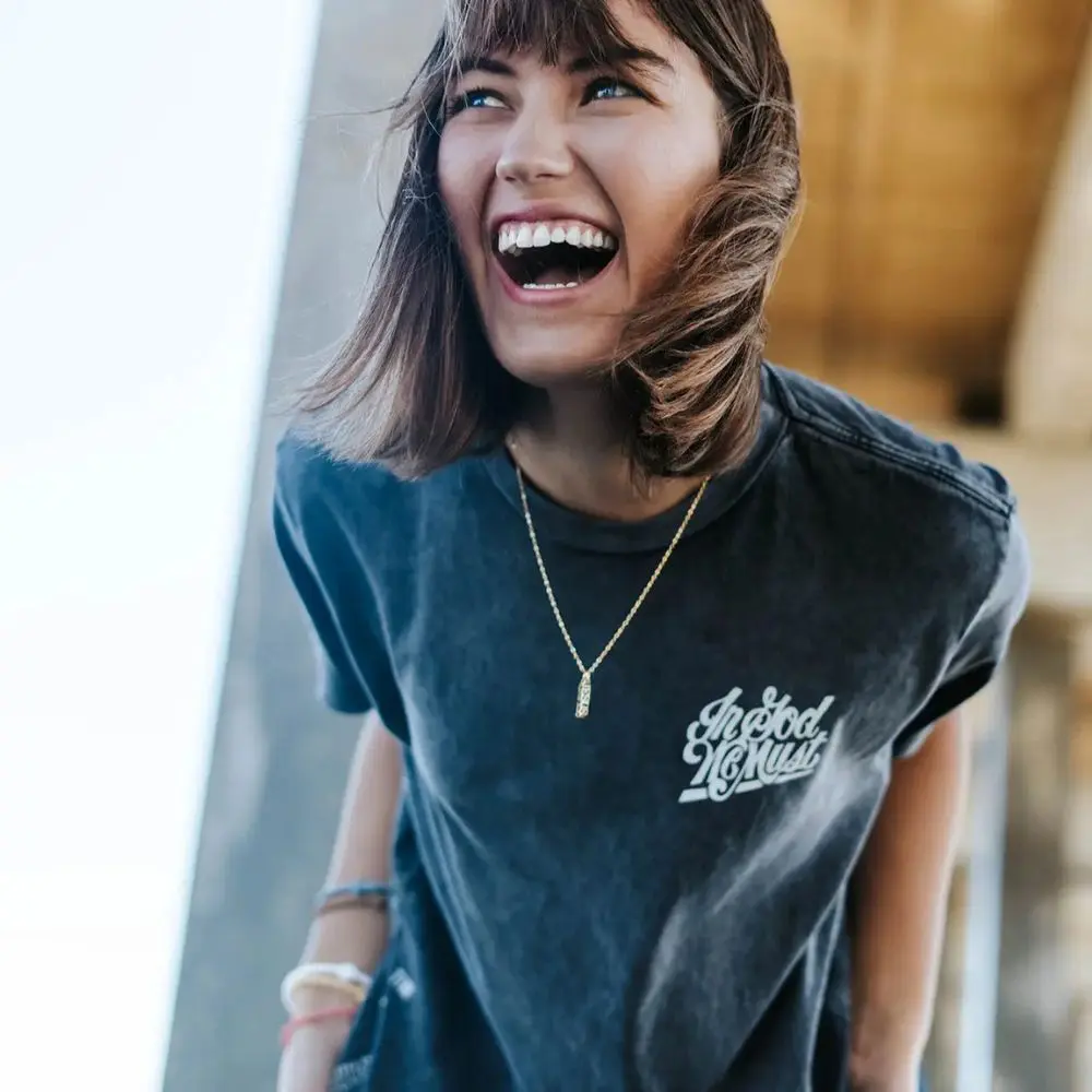 Woman wearing unisex Jesus Saves stainless steel necklace