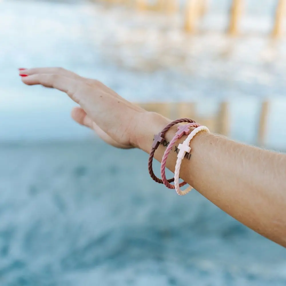 Lifestyle image of Twilight silicone bracelet set worn on wrist