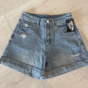 Women's high waist light wash distressed denim shorts with rolled hem