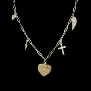Gold faith charm necklace with heart, cross, wing, and lightning bolt charms