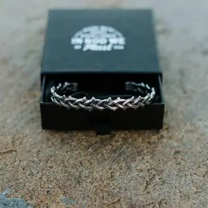 Stainless steel thorn bracelet inside black jewelry box