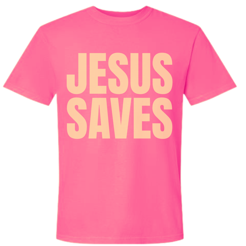 Neon pink Comfort Colors t-shirt featuring oversized yellow Jesus Saves lettering.