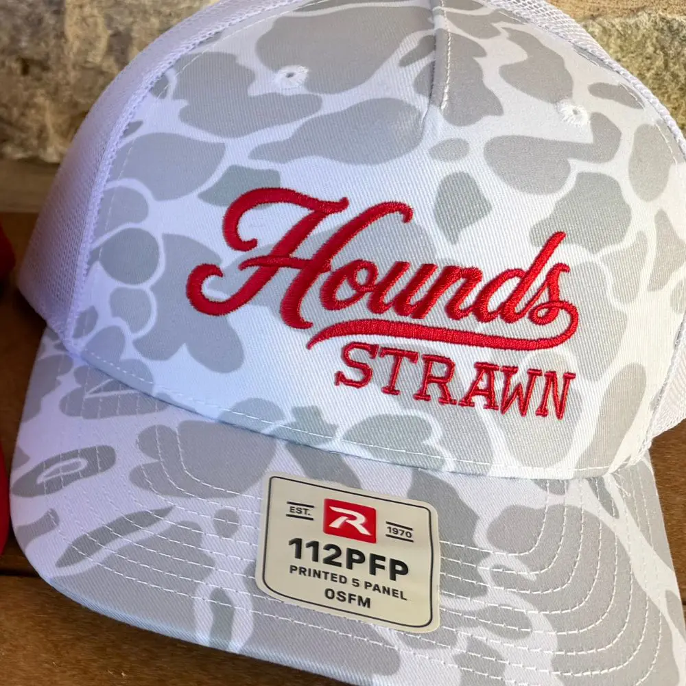 Grey camouflage trucker hat with red embroidered Hounds script and Strawn lettering