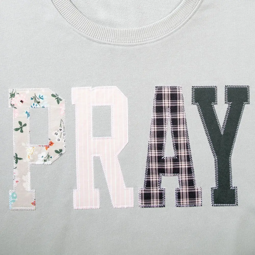 Bay Green PRAY Sweatshirt with floral plaid and striped patchwork letters