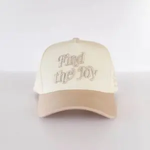 Find The Joy Puff Embroidered Hat in khaki and tan by Conviction Co.