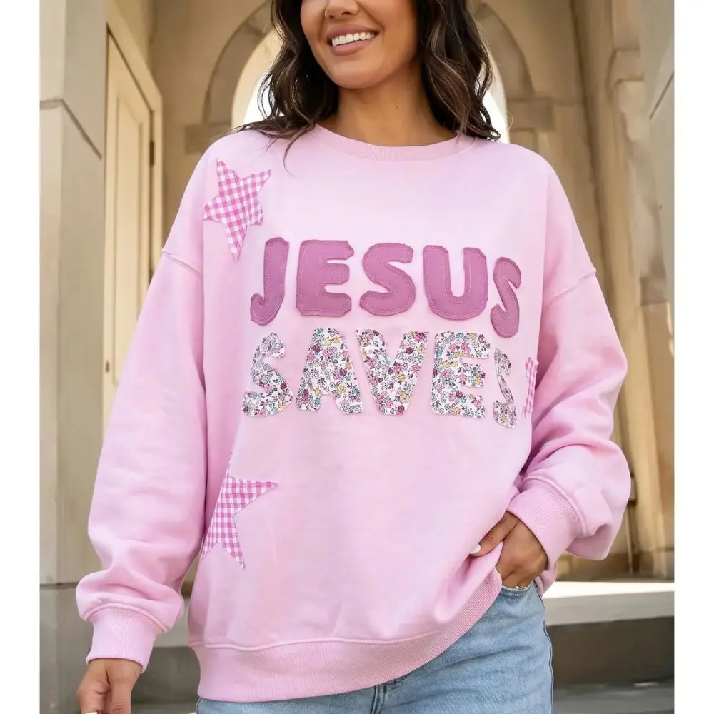 Woman wearing Patchwork Jesus Saves Baggy Sweatshirt in pink