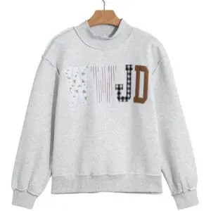 WWJD Mock Neck Patchwork Sweatshirt with mixed fabric appliqué lettering