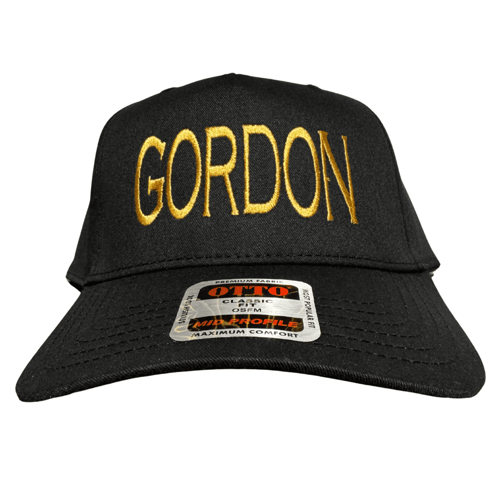 Front view of black OTTO hat with gold GORDON embroidery