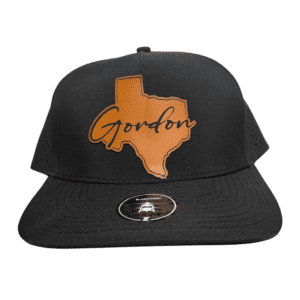 Black five-panel hat with Texas-shaped leatherette patch reading "Gordon"