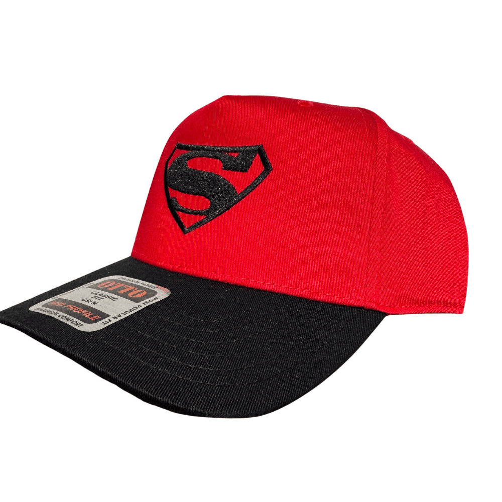 Side view of red OTTO hat with black embroidered Strawn S logo and black bill